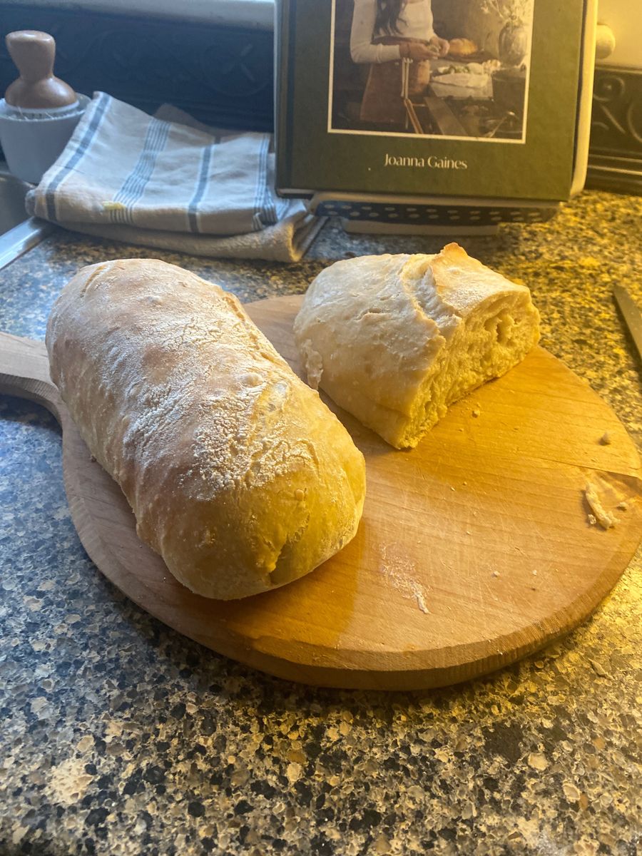 Rustic bread loaves on a wooden board